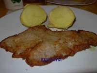   Filetes de ternera empanados con patata cocida