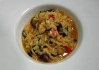   ARROZ CALDOSO con CODIUM, PERCEBES y LANGOSTA