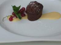   LINGOTES DE CHOCOLATE Y NARANJA SOBRE SALSA DE VAINILLA BOURBON