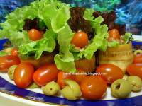   Recetas crudívoras de entradas.  Barrilitos de zucchini crudo marinado rellenos de guacamole y semillas de chía.