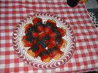   PIQUILLOS RELLENOS DE RAPE EN SALSA NEGRA